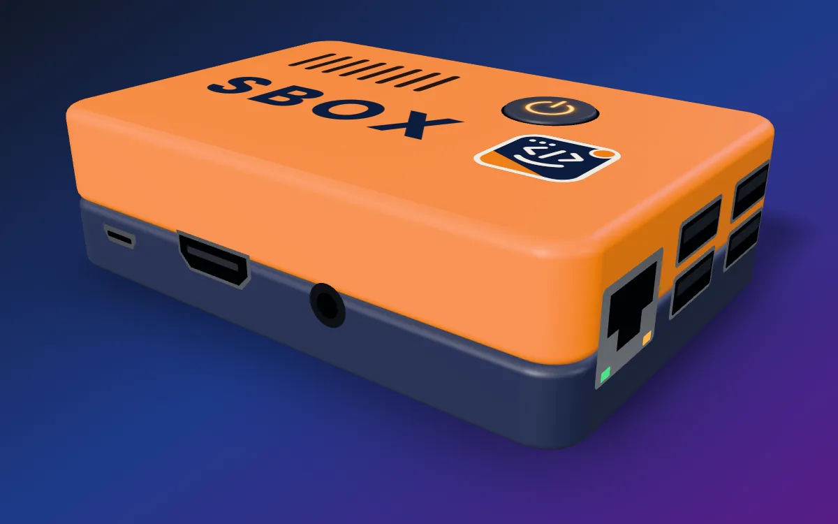 SBOX, a small orange and navy computer with the SmileyTech logo