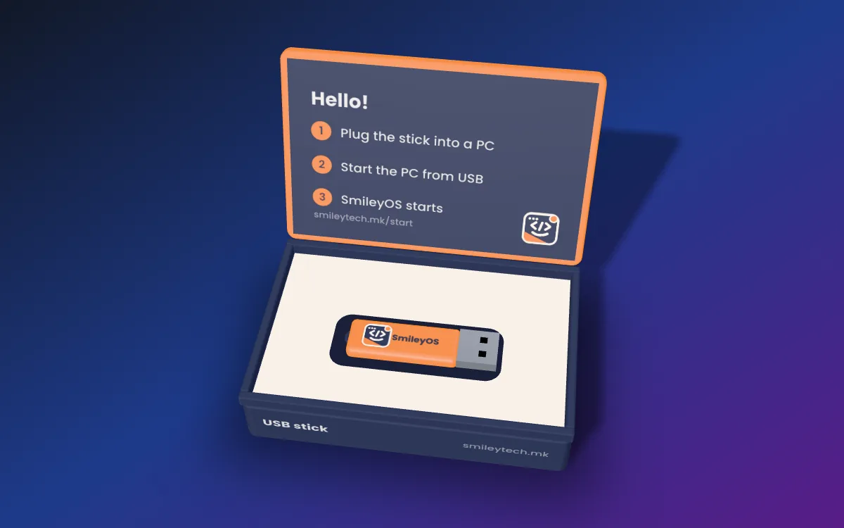 The SmileyOS for PC box, orange and navy, with a USB stick